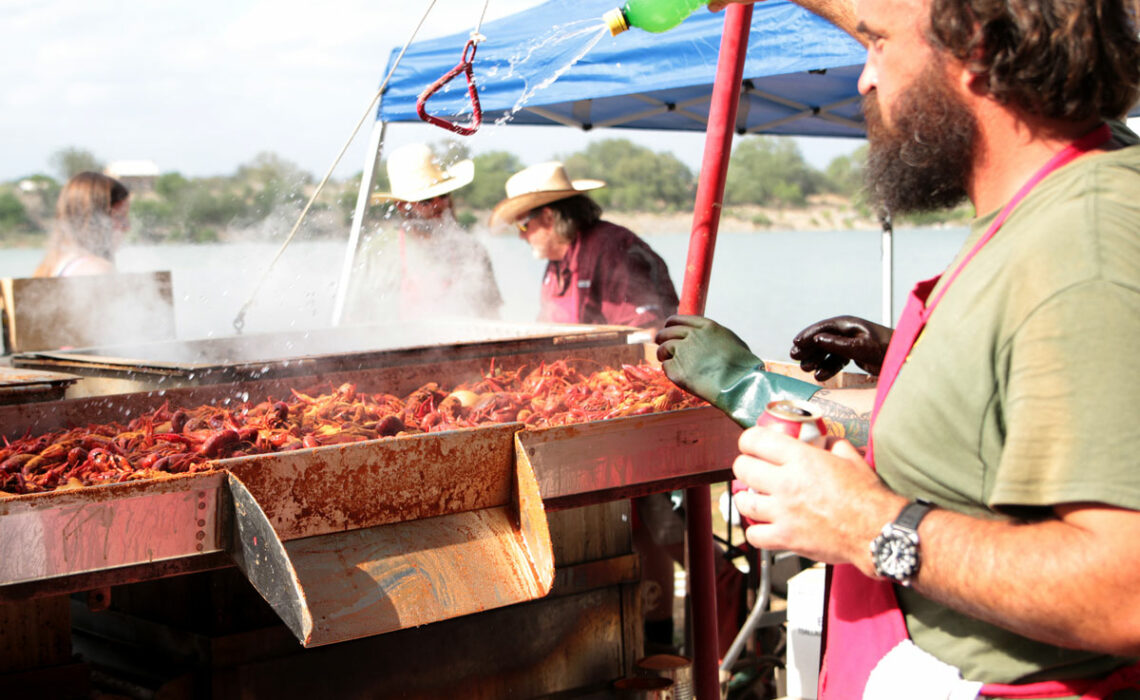 man boiling crawfish