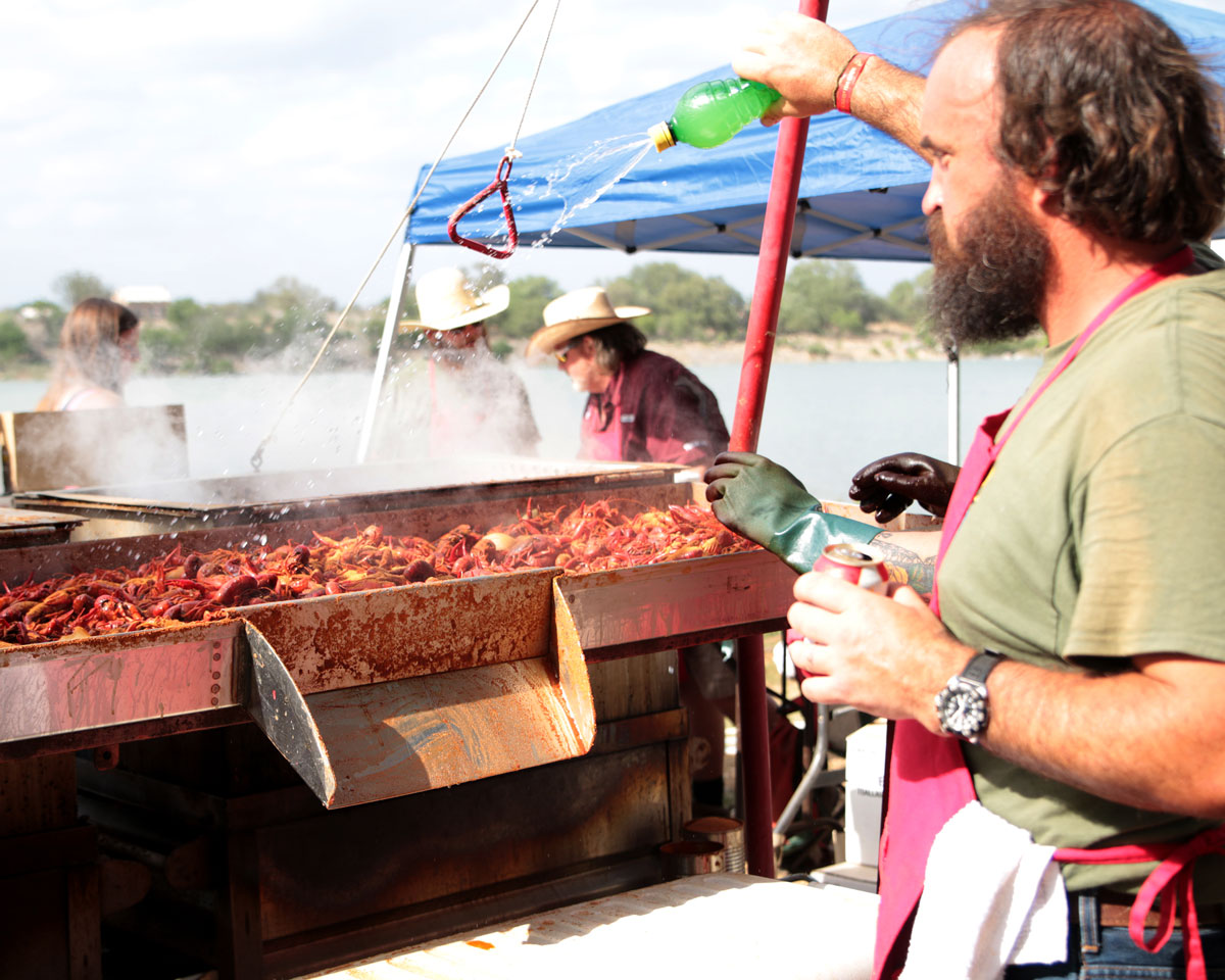 man boiling crawfish