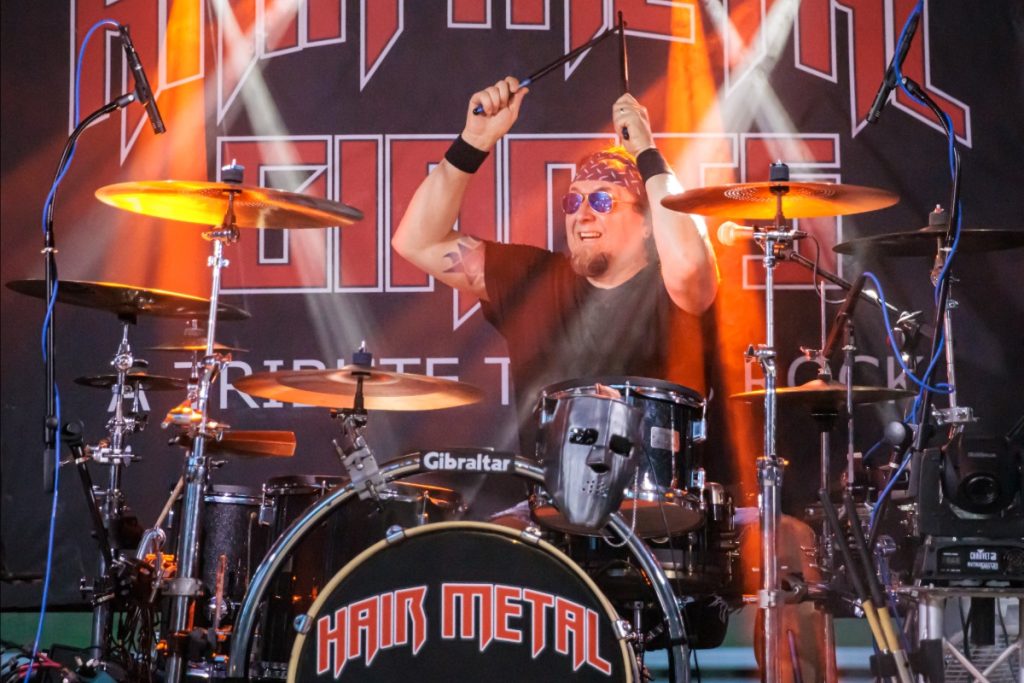 Hair Metal Giants drummer performing