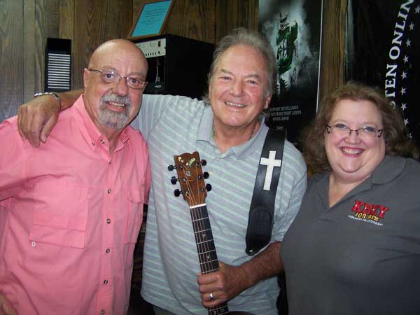 KBEY 103.9 FM Radio Picayune guest Alex Harvey (center) with Ed and Kay.