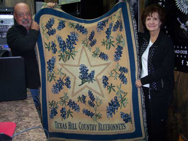 Ed Chandler of KBEY and Barbara Bengston of the PEO Chapter IG.