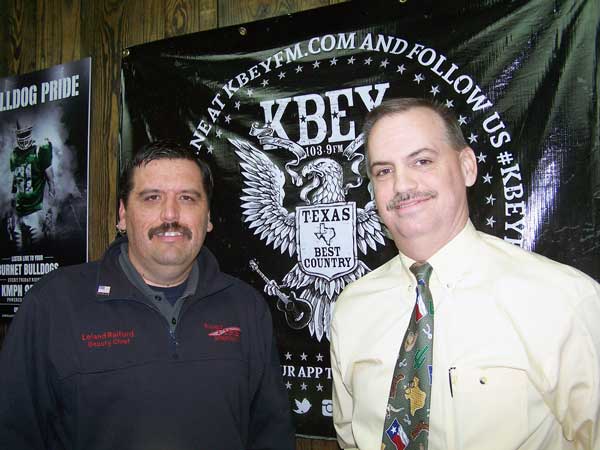 KBEY 103.9 FM Radio Picayune guests Lealand Raiford (left) of the Burnet Fire Department and Paul Nelson of the Burnet Police Department.