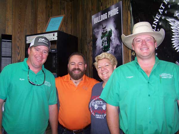 Jason Jamar (in orange) of the 'JBar Weekend Restroom Report' talks with Ryan Hill (left), Jamie Garrett, and Logan Vann and Lampasas's Spring Ho.