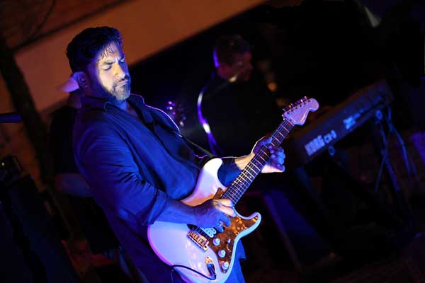 KBEY 103.9 FM Radio Picayune guest Reno Perez performs Saturday at FiestaJAM on Lake Marble Falls.