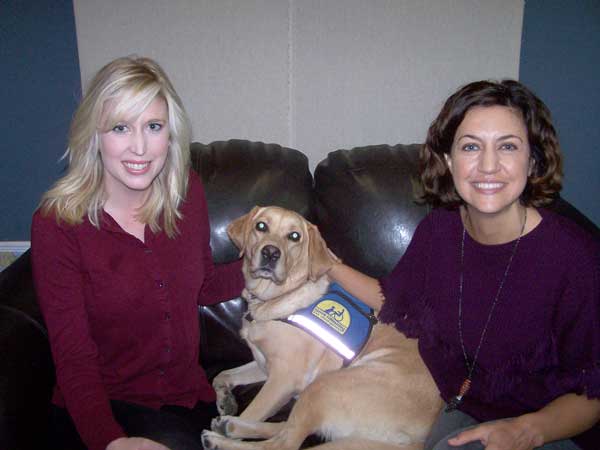 KBEY 103.9 FM guests Blakeley Wilbanks (left), Mabel the Wonder Dog, and Sarah Garrett of the Phoenix Center.