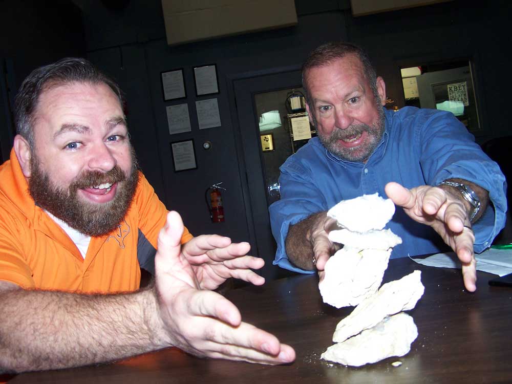Jason Jamar (left) of JBar Contractor's Services and Tex Toler talk about the 2018 Llano Earth Art Festival for this week's 'JBar Weekend Restroom Report' on KBEY 103.9 FM Radio Picayune.