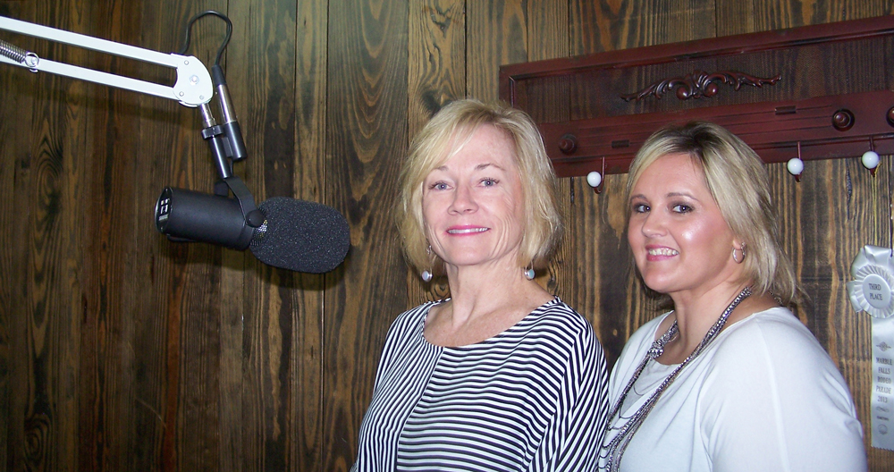 Patti Zinsmeyer (left) and Brandi Payne of the Marble Falls/Lake LBJ Chamber of Commerce talk about the June 2 Market Day on Main.