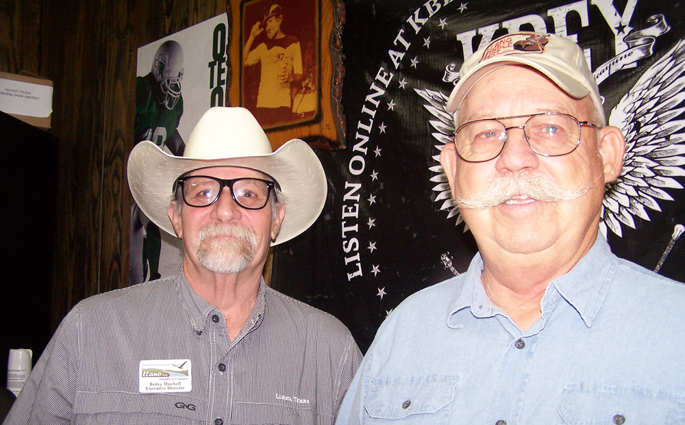 KBEY 103.9 FM guests Briley Mitchell (left) of the Llano Chamber of Commerce and Chris Slade of the Llano County Community Center talk about the Llano Open Pro Rodeo.