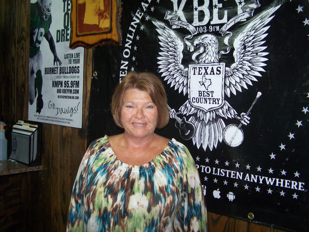 Debbie Povec in the KBEY studio