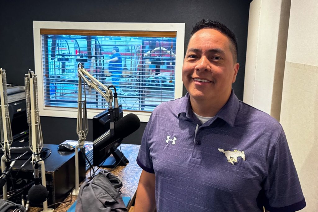 Man being interviewed on radio