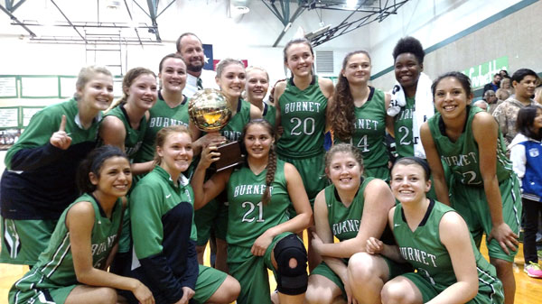 The Burnet High School girls basketball team celebrates its 77-66 win over Brazosport on Feb. 23. Courtesy photo