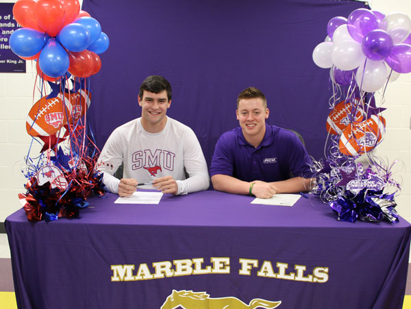Marble Falls High School senior football players Ryan Becker (left) and Ethan Reed at their signing ceremony Feb. 3. Staff photo by Jennifer Fierro
