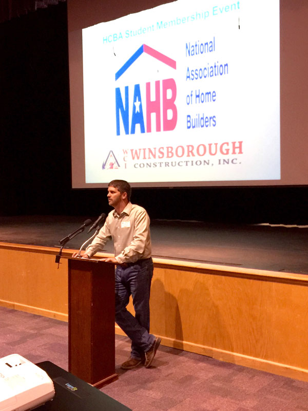 Matt Fields of FieldsCo Builders and the Hill Country Builders Association speaks to Marble Falls High School building trades students about the benefits of a membership in the National Association of Home Builders. HCBA presented a national membership, underwritten by Winsborough Construction, to each of the students March 3.