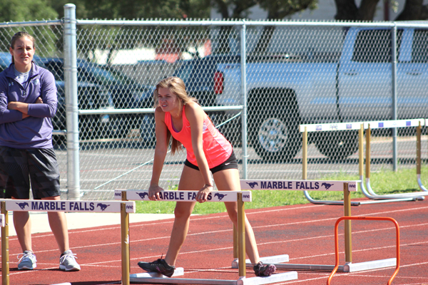 Marble Falls High School senior Natalie Schulz gets instructions before performing the next drill during a recent workout. Staff photo by Jennifer Fierro