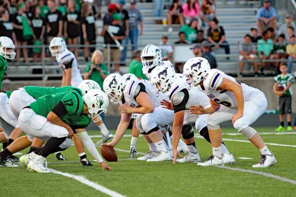 Though maybe not as glamorous as the ‘skill’ positions, the line plays a crucial role in the success of a football team. Though strength is a big part of a good lineman, experts explain that the position also relies on quickness, speed and finesse. Photo by Diana Cox