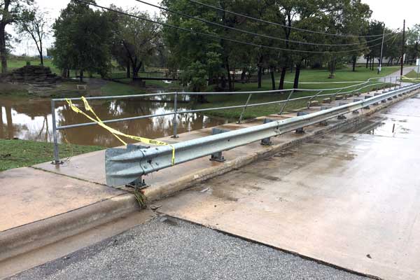A rainstorm and flooding Nov. 6 damaged the railing on the Backbone Creek bridge at Johnson Park. Marble Falls city staff are working to repair the railing as well as the irrigation system at the park, which was also damaged.