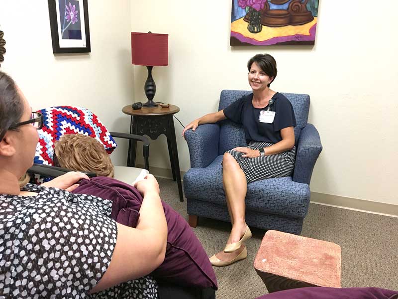 Hill Country Memorial Hospice grief counselor Randa Kirchner, a licensed clinical social worker, visits with a client in the hospice’s counseling room. HCM Hospice provides free grief counseling to anyone in the community. Courtesy photo