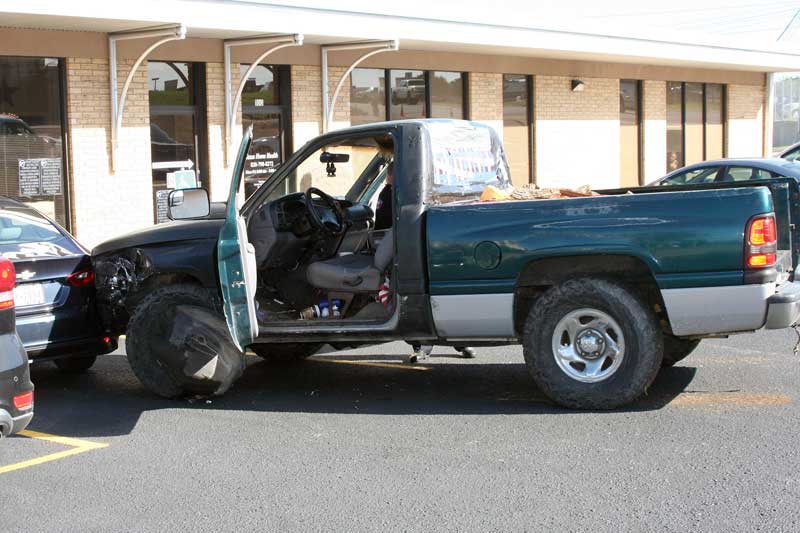 Authorities are investigating a collision Aug. 11 involving a pickup and a car on Avenue K in Marble Falls. Staff photo by Connie Swinney