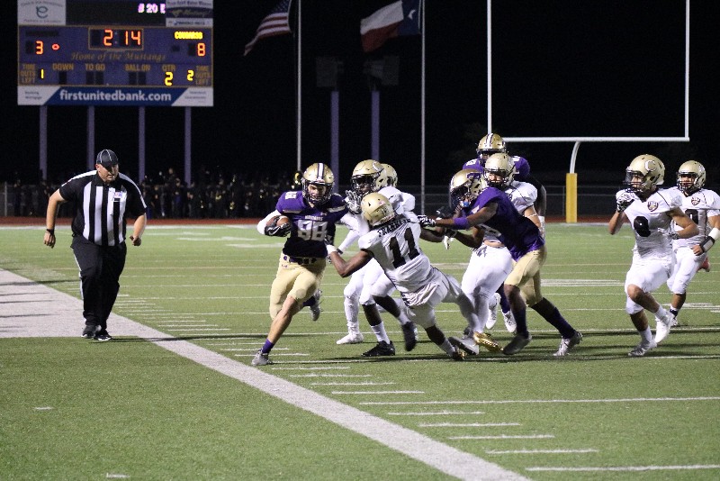 Marble Falls senior receiver Keegan Deering runs for some of his 32 yards receiving during the 16-8 win over Austin Crockett Sept. 15. Photo by Martelle Luedecke