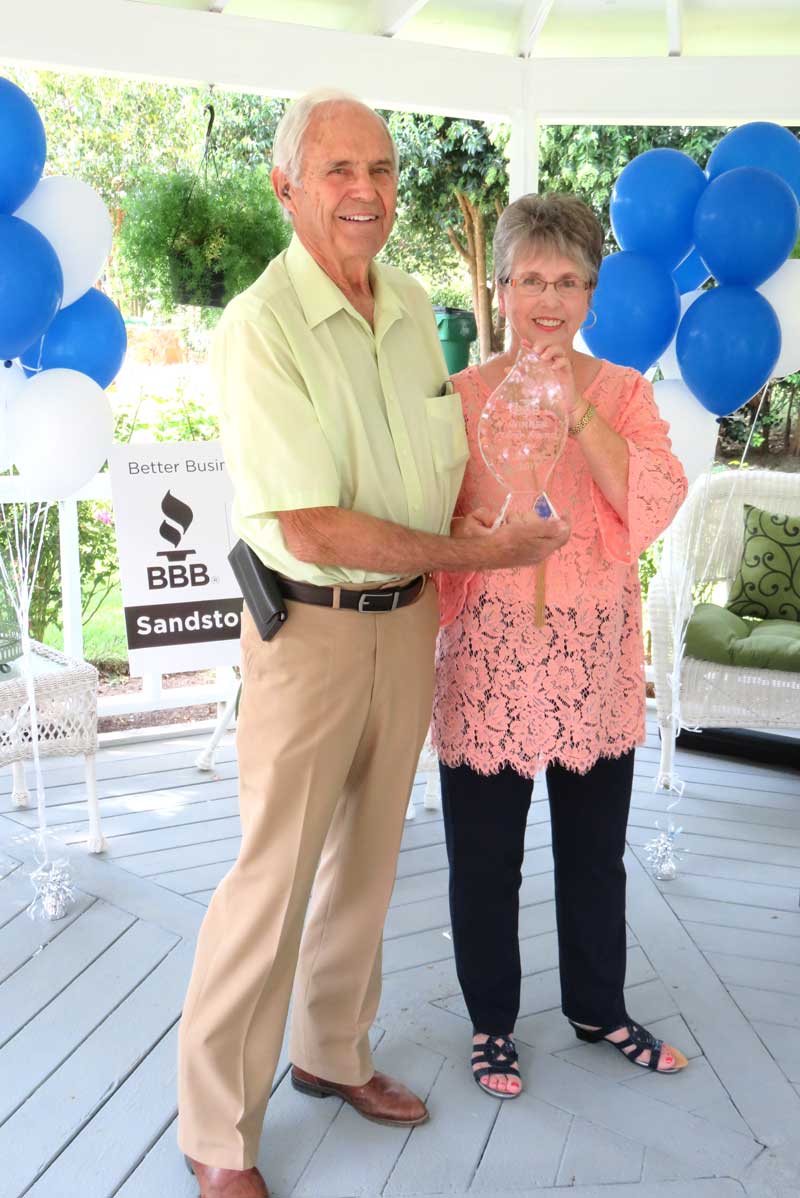 Jack and Virginia Walker of Sandstone Street Bed and Breakfast in Llano show off their new ‘hardware’ after Better Business Bureau officials presented them with the Better Business Bureau Torch Award for Ethics. Sandstone Street Bed and Breakfast is only one of four businesses in a 105-county area honored with the award. Courtesy photo