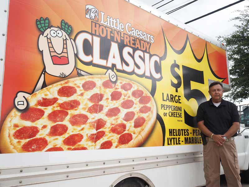 Rene Jackson was aiming for 30 years in the Army, but a second bout with cancer cut his goal short by two. Many veterans ponder what they’ll do after a military career, but after careful research and study, Jackson settled on selling pizzas. Jackson and his wife, Sandra, who works in the Pentagon, are opening a Little Caesars franchise in Marble Falls. Staff photo by Daniel Clifton