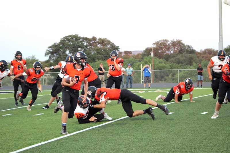 Llano High School senior running back Mason Brooks runs for a first down during the Yellow Jackets’s 35-21 loss to Smithville on Sept. 1. Llano hosts Sonora on Sept. 8. Kickoff is at 7:30 p.m. Staff photo by Jennifer Fierro