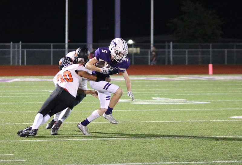 Marble Falls High School senior receiver Bryce Murphy is one of nine Mustangs to record at least one catch this season. Photo by Luedecke Photography