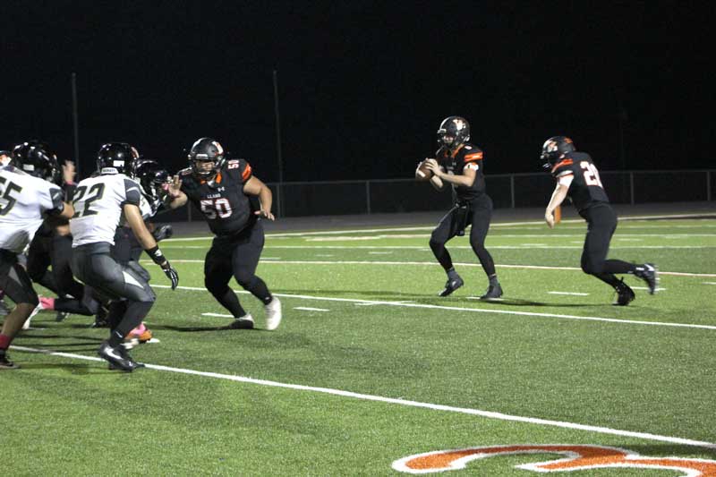 Llano High School sophomore quarterback Cade Fly must continue to make sound decisions with the football, especially against Navarro, the Yellow Jackets’ district-opening opponent on Friday, Oct. 13. Staff photo by Jennifer Fierro