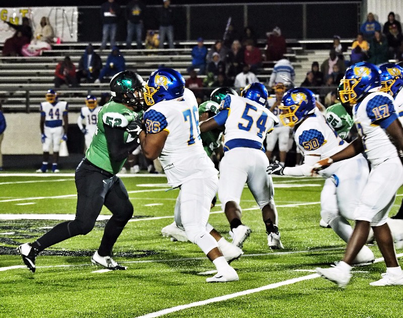 Burnet’s Michael Rodriguez goes nose to nose with Waco La Vega’s Alex Gomez during the game Nov. 10. The Pirates capped off a perfect regular season with the 63-3 win over the Bulldogs. Staff photo by Daniel Clifton