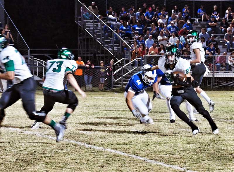 Burnet’s Ian Carter finds running room during the Bulldogs’ game against the Lampasas Badgers on Nov. 3. The Badgers won 51-35. Burnet closes out the season on Friday, Nov. 10, when they host Waco La Vega. Staff photo by Daniel Clifton