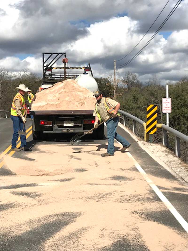 Burnet County dispatched sand truck crews Jan. 15 to areas where icy roadways could pose a risk to motorists. Courtesy photo