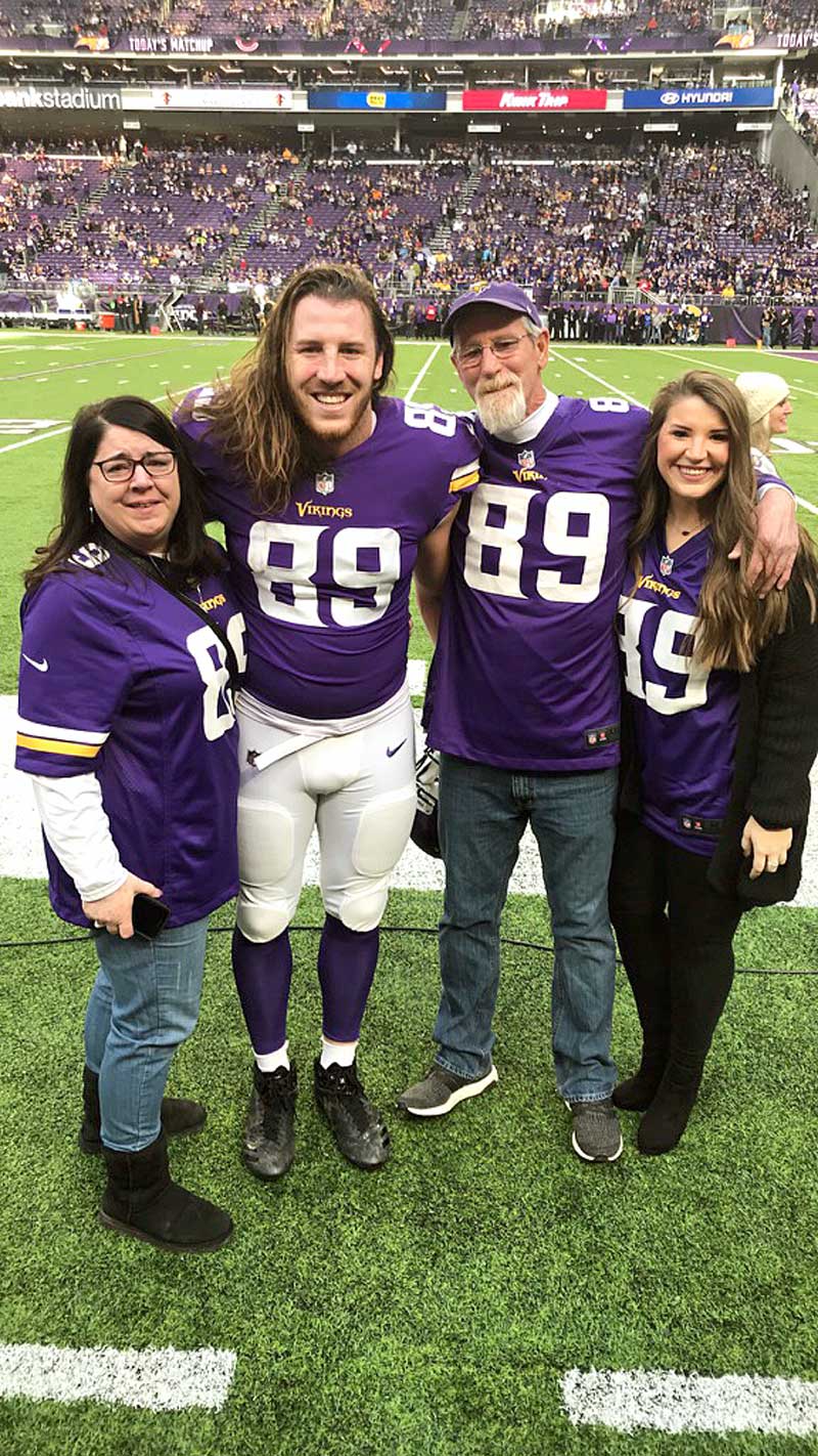 The Morgan family — mom Chris (left), dad Dave, son David, and daughter Megan — celebrate the Minnesota Vikings’ win over the Green Bay Packers on Dec. 23 at Lambeau Field. Former Marble Falls Mustang David Morgan and his Vikings team play the New Orleans Saints on Sunday, Jan. 14, at U.S. Bank Stadium in Minneapolis to determine which team advances to the NFC championship game. The game kicks off at 3:40 p.m. on FOX. Courtesy photo