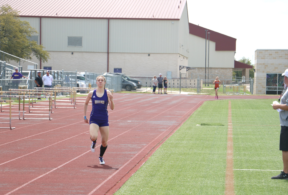 Marble Falls High School freshman Bailey Goggans finished the 800 meters in 2 minutes 11.39 seconds to set a new Daybreak Rotary Club Mustang Relays record and break her own record that she set in late February. The time is tops in the state and ranks fifth nationally. Staff photo by Jared Fields