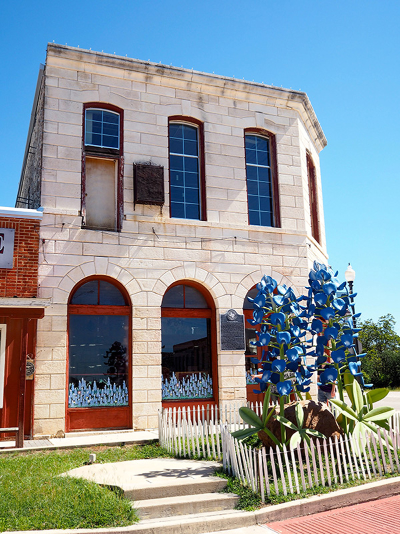 Burnet Economic Development Corp. has decided to sell a 21-acre planned commercial park on Texas 29 to free up funding for Badger building renovations. The historic building is located on the Burnet County Courthouse square. Staff photo by Connie Swinney