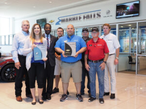 Chevrolet Buick Marble Falls earned the GM Mark of Excellence Award for both Buick and Chevrolet brands for the staff’s efforts in 2017. It’s the only dealership in Central Texas to receive the awards. This is the second year in a row the Marble Falls dealership has garnered the honors, which is quite impressive considering its only been under its current ownership for about 2½ years. Pictured are President Greg Wessels, office manager Lauren Duran, GM District Manager Robert Owusu, new car sales manager Jason Duran, used car sales manager Damon Farmer, service manager Geoff McElroy, parts manager Rand Bettencourt, and manager Matt Wessels. Staff photo by Daniel Clifton