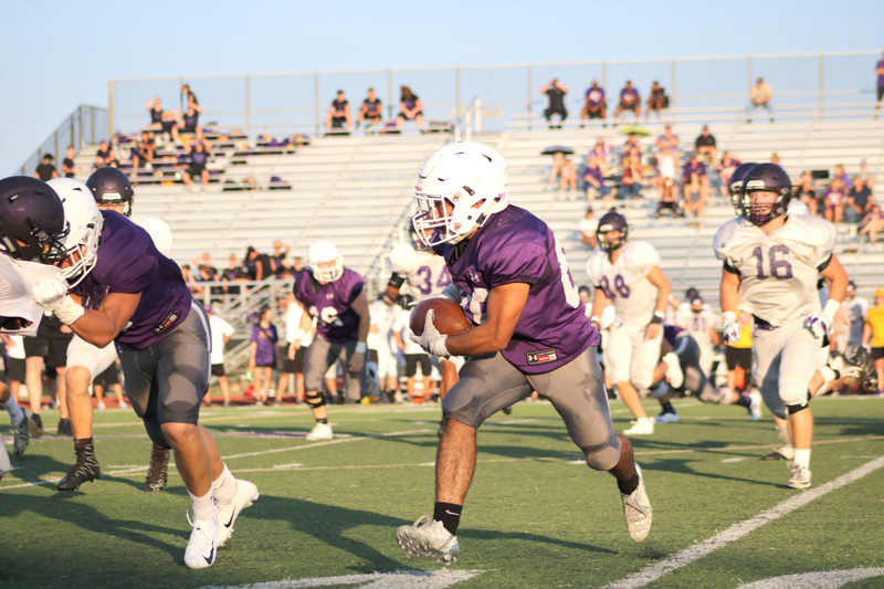 Marble Falls sophomore receiver Andrew Rodriguez looked for a block during the scrimmage against Liberty Hill on Aug. 24. The Mustangs open the season Aug. 31 at Canyon Lake. Kickoff is 7:30 p.m. Photo by Martelle Luedecke/Luedecke Photography