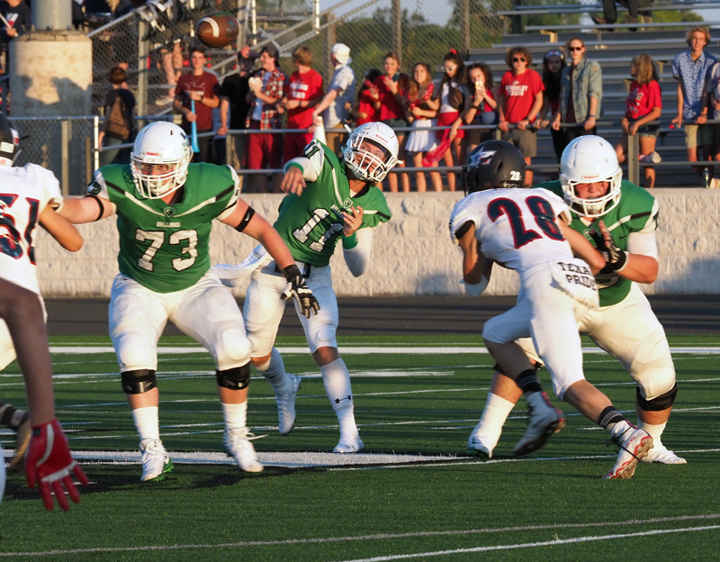 Burnet quarterback Jaxson Denton throws a pass during Burnet’s game Aug. 31 against Wimberley. The Texans got the 31-25 win, but it was a tight game coming down to the final minutes. On Friday, Sept. 7, the Bulldogs head to Marble Falls for the 104th meetup between the two Burnet County programs. Kickoff is 7:30 p.m. at Mustang Stadium, 2101 Mustang Drive. Staff photo by Daniel Clifton