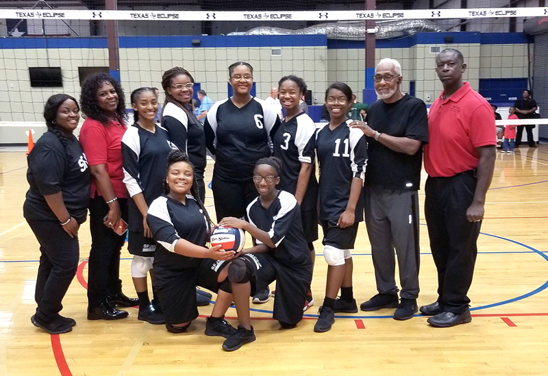 The Smoking for Jesus Christian School volleyball team includes Judah Thompson (front row, left) and Zion Eaglin; assistant coach Trenae Thompson (standing, left), Principal Minister Claudette Monnet, Zynarrea Johnson, Rachel Gauff, BreiAnna Branch, Rebecca Frazier, Nia-Mya Frazier, Senior Administrator Pastor Willie Monnet Sr., and head coach William Tumblin. The volleyball team made it to the Texas Chrisitan Athletic League state tournament in 2018. Courtesy photo