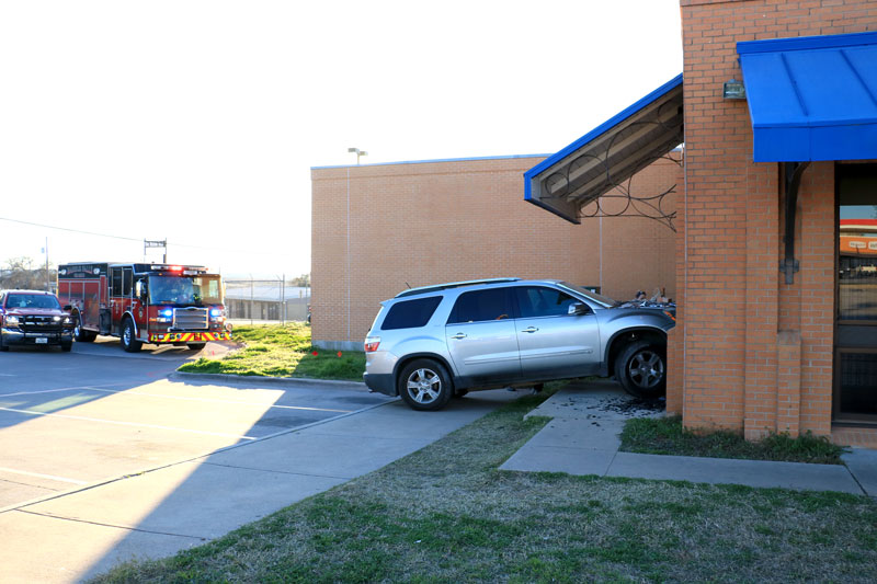 The Marble Falls Post Office remained open after a vehicle crashed into the side of the building Jan. 23. Staff photo by Jared Fields
