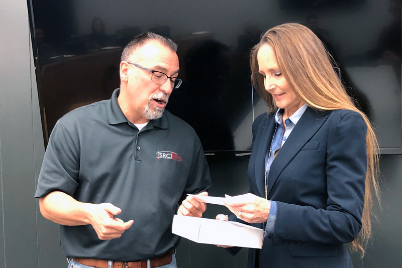 Marble Falls Economic Development Corp. board President Steve Reitz recognized former board member Jane Marie Hurst during the regular meeting Jan. 2. Hurst resigned from the board in December to take office as the Burnet County Precinct 3 justice of the peace. Staff photo by Jared Fields
