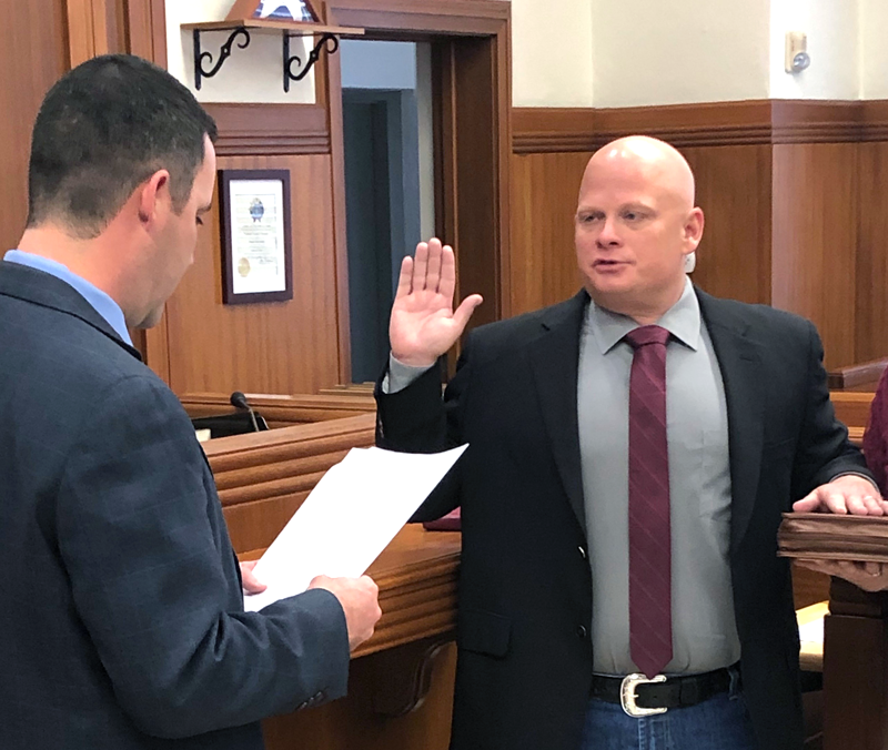 Damon Beierle, incoming Burnet County Precinct 2 Commissioner, takes the oath of office Jan. 1 during a ceremony at the Burnet County Courthouse. Administering the oath is 424th Judicial District Judge Evan Stubbs. Photo courtesy of James Oakley