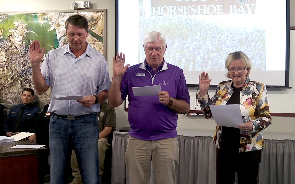 Horseshoe Bay City Councilors Frank Hosea (left) and Randy Rives and Mayor Cynthia Clinesmith