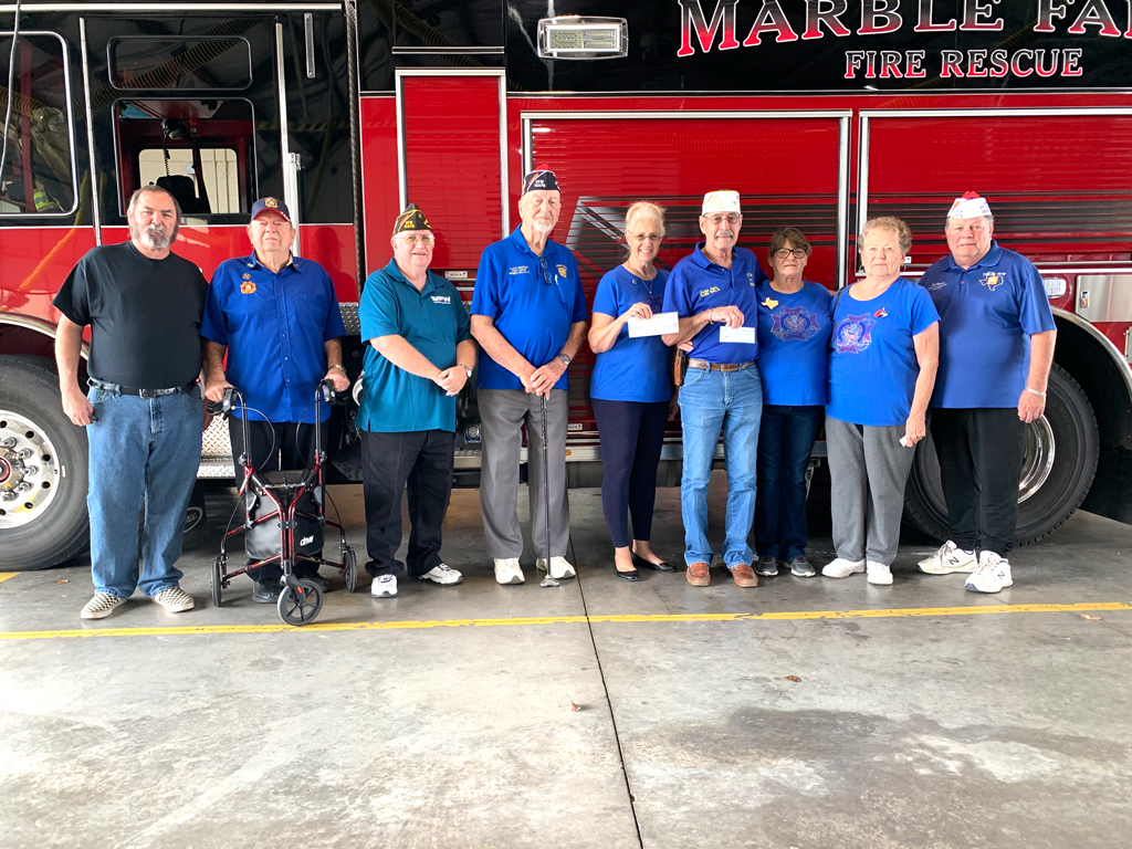 Members of the Marble Falls VFW Post 10376 and the Rotary Club of Marble Falls