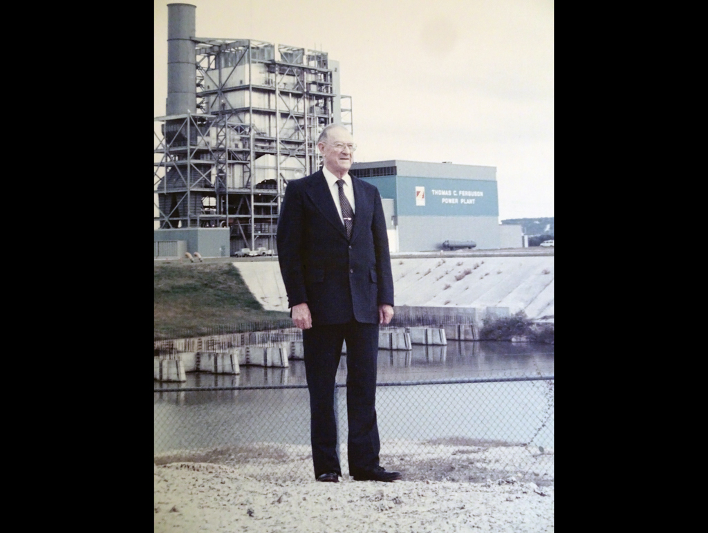 Thomas C. Ferguson in front of power plant