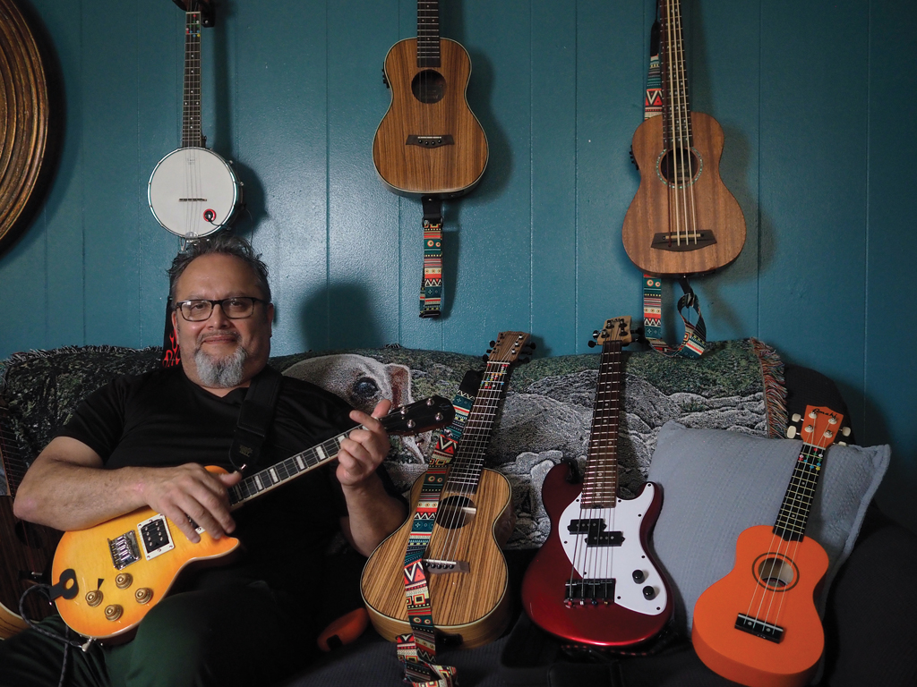 Mario Martinez with his ukuleles