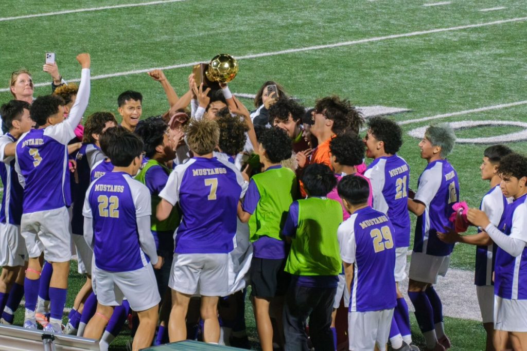 soccer team celebrating win