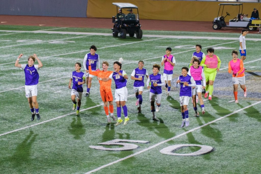 soccer team celebrates win