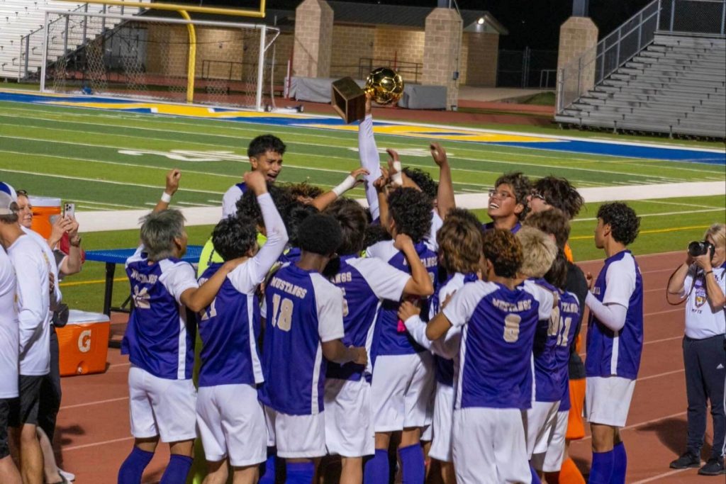 soccer team celebrates win