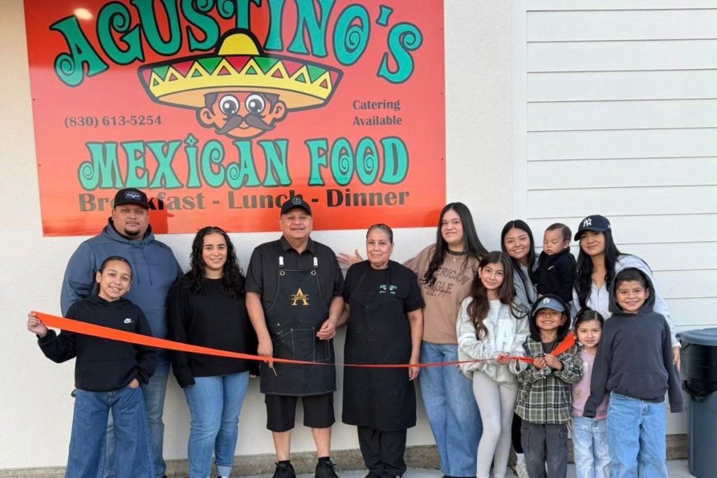 Agustino's ribbon cutting
