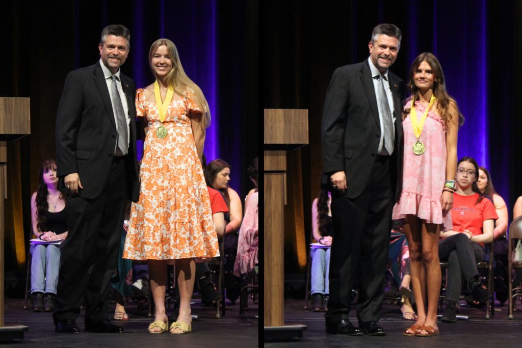 Marble Falls Independent School District Superintendent Dr. Jeff Gasaway recognizes valedictorian Chloe Brown (left) and salutatorian Kate McCary during the annual Scholarship Awards Night on May 8. MFISD photos